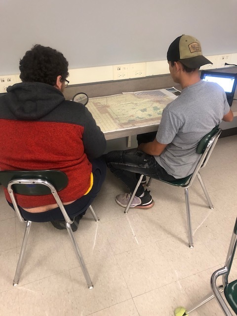 students study maps