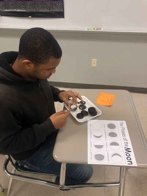Student uses Oreos to study the moon.